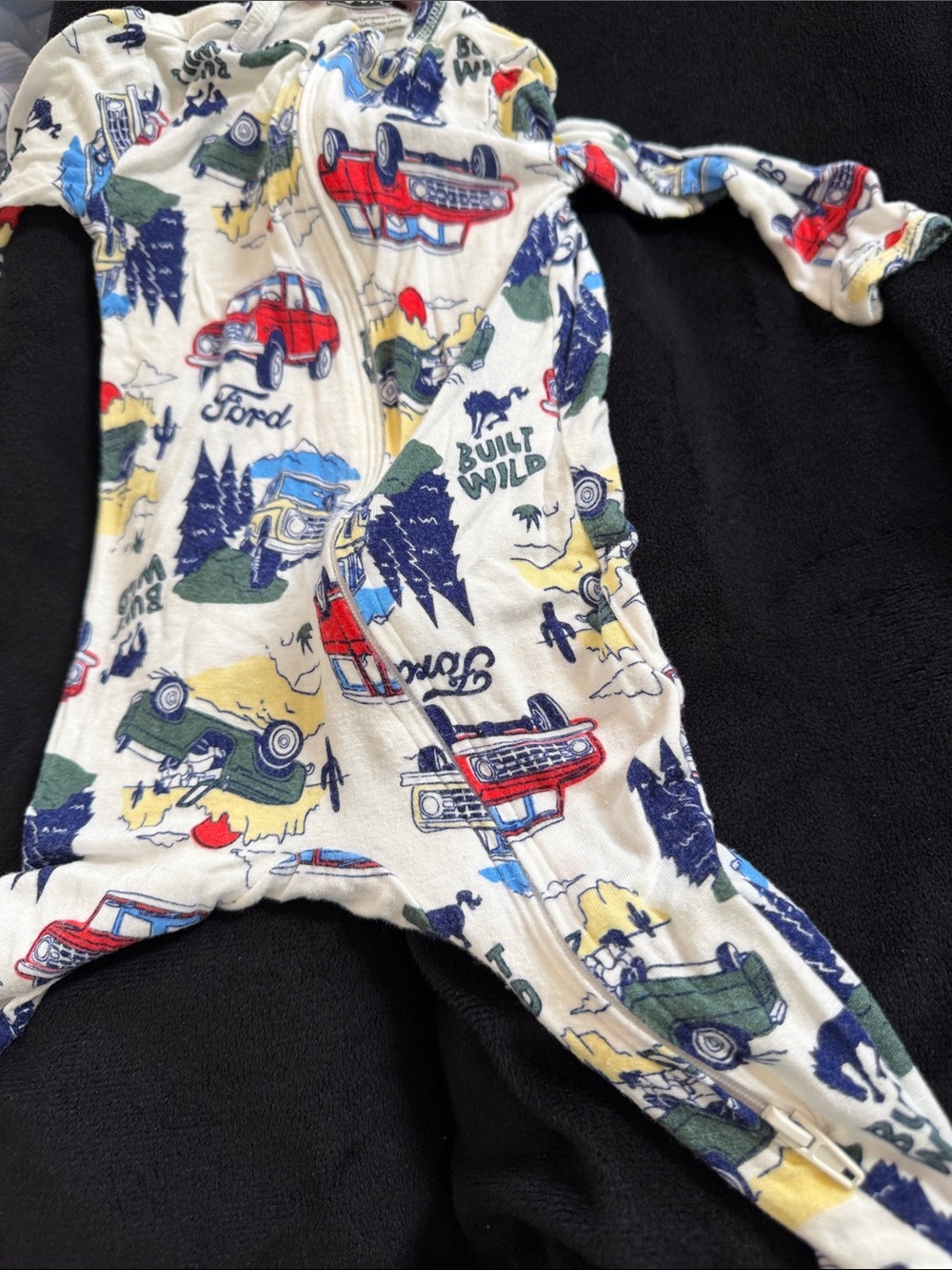Ford White One-Piece Bodysuit with Red, Blue, Green and Yellow Car Print
